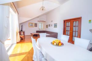 Postel nebo postele na pokoji v ubytování Mediterranean Blue Apartments
