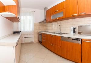 Kuchyň nebo kuchyňský kout v ubytování Mediterranean Blue Apartments