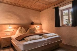 Postel nebo postele na pokoji v ubytování B&B Ciastel