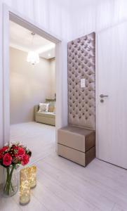 A bed or beds in a room at Xen Premium Apartment