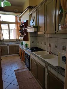 Kuchyňa alebo kuchynka v ubytovaní La Casa del Sole