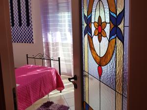 Posteľ alebo postele v izbe v ubytovaní La Casa del Sole
