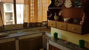 Kuchyňa alebo kuchynka v ubytovaní La Casa del Sole + 37 fotografií