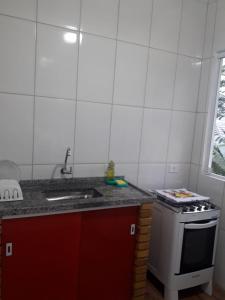 Kuchyň nebo kuchyňský kout v ubytování som das aguas paraty