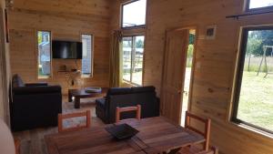 Una televisión o centro de entretenimiento en Rustico Pucon