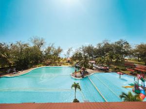 an overhead view of a large swimming pool at a resort at Resorts World Kijal in Kijal