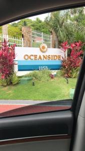 a view of a sign from a car window at TOTAL Mar in Niterói