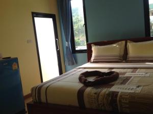 Letto o letti in una camera di Baan Mulan