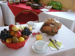 
Options de petit-déjeuner proposées aux clients de l'établissement Hôtel le Roudou
