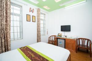 Voodi või voodid majutusasutuse Phuong Dong hotel toas