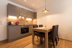 Kuchyň nebo kuchyňský kout v ubytování Apartment Waldesruh