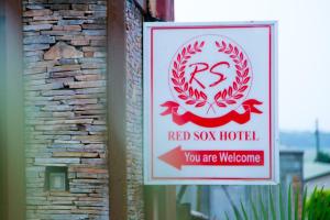 Certifikát, hodnocení, plakát nebo jiný dokument vystavený v ubytování Red Sox Hotel Ltd