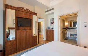 Postel nebo postele na pokoji v ubytování Pera Palace Hotel