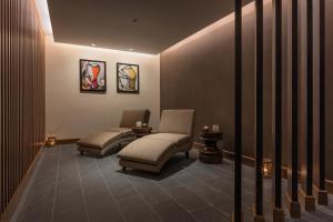 Neelkanth Sarovar Premiere客房内的一张或多张床位