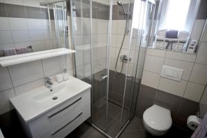 Kúpeľňa v ubytovaní Apartman "Mary"