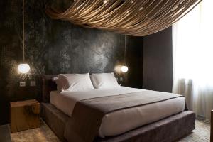 Letto o letti in una camera di Fornace Suite