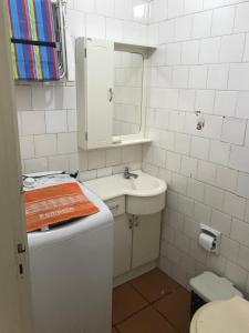 Ванна кімната в Ap da Sepé excelente localização