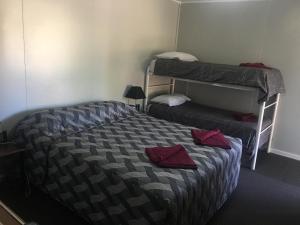 Ένα ή περισσότερα κρεβάτια σε δωμάτιο στο Amble Inn