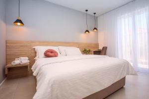 Postel nebo postele na pokoji v ubytování Villa Petra