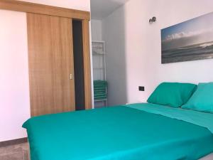 Llit o llits en una habitació de Sunny Studio Lanzarote