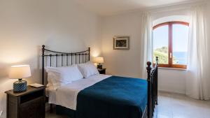 La Matrangela Charme Apartments客房内的一张或多张床位