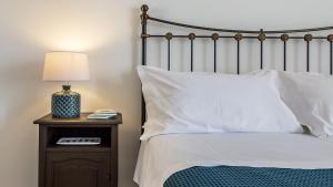 La Matrangela Charme Apartments客房内的一张或多张床位