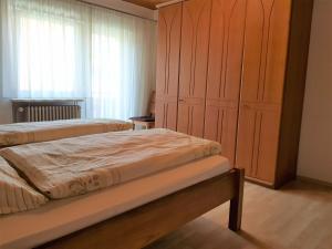Postel nebo postele na pokoji v ubytování Spinnertonihof