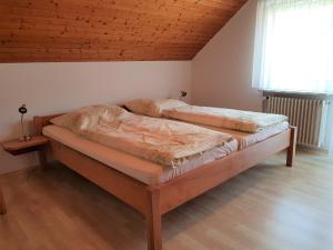 Postel nebo postele na pokoji v ubytování Spinnertonihof