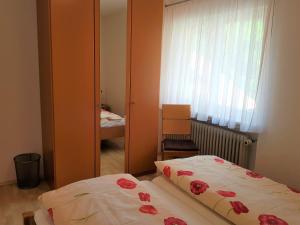 Postel nebo postele na pokoji v ubytování Spinnertonihof
