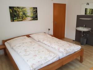 Postel nebo postele na pokoji v ubytování Spinnertonihof