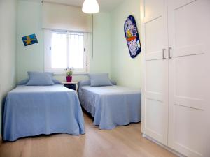 Posteľ alebo postele v izbe v ubytovaní Apartment Europa I by Interhome + 15 fotografií