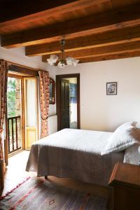 Cama o camas de una habitación en Hotel Rural La Puebla