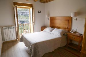 Cama o camas de una habitación en Hotel Rural La Puebla