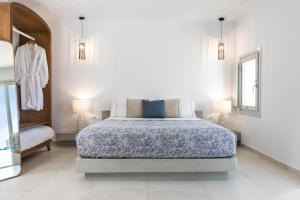 Postel nebo postele na pokoji v ubytování Myst Boutique Hotel