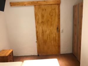 Voodi või voodid majutusasutuse TU Ferienzimmer in Ulm Stadtmitte toas