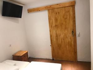 Voodi või voodid majutusasutuse TU Ferienzimmer in Ulm Stadtmitte toas