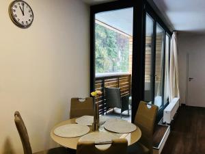 Posezení v ubytování Útulný apartmán u Mumlavských vodopádů