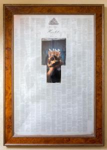 a framed picture of a woman wearing a crown at Ashgrove House in Stratford-upon-Avon