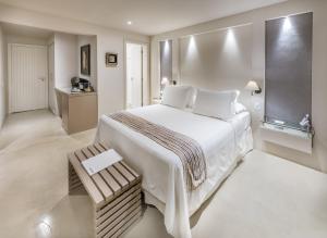 Voodi või voodid majutusasutuse Abracadabra Boutique Hotel toas