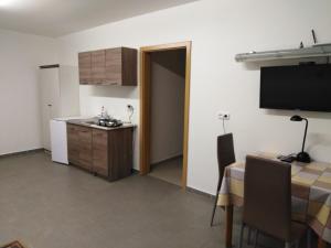 Kuchyň nebo kuchyňský kout v ubytování Hotel BESTAR + 13 fotografií