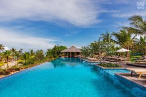 a swimming pool at the resort at Zuri Zanzibar in Kendwa