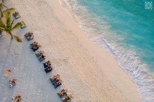 an overhead view of a beach with a group of people at Zuri Zanzibar in Kendwa