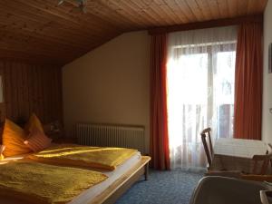 Cama o camas de una habitación en Haus Holaus