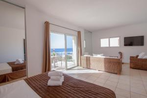 Postel nebo postele na pokoji v ubytování Hôtel Lilium Maris