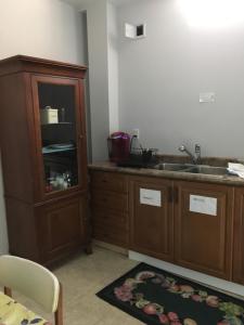 A cozinha ou cozinha compacta de Freeda's Place