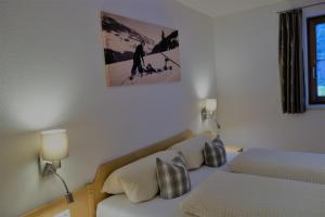 A bed or beds in a room at Ferienwohnung Brugger