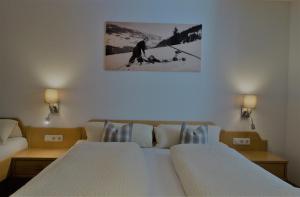 A bed or beds in a room at Ferienwohnung Brugger