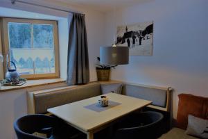 A seating area at Ferienwohnung Brugger