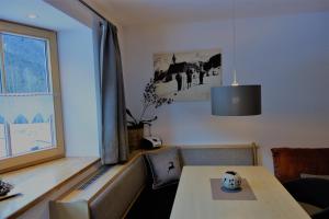 A seating area at Ferienwohnung Brugger