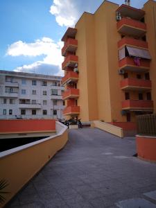 a large parking lot in front of some buildings at Casa vacanze low cost in Gallipoli